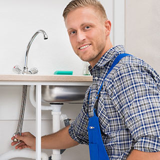 Plumber Fixing Sink - Lead Image for Plumbers Page