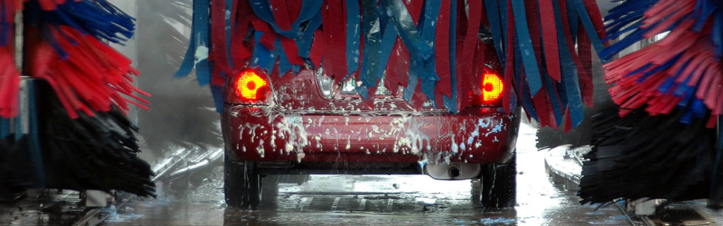Red Car Being Washed - Lead Image for Car Washes Page