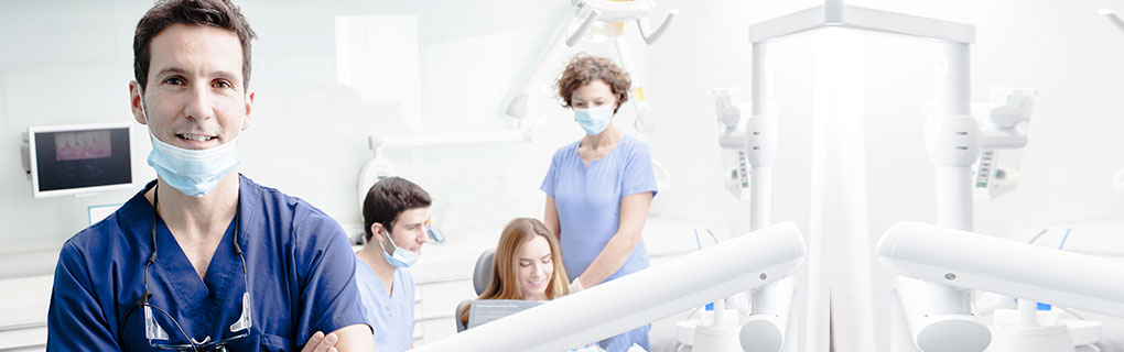 Dentist with Dental Nurses and Patient - Lead Image for Dentist Office Page