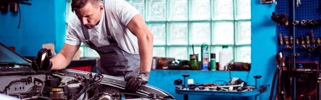 Car Mechanic Fixing an Engine - Lead Image for Service Stations and Mechanics Page