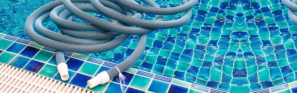 Swimming Pool Hose on Pool - Lead Image for Swimming Pool Service Page