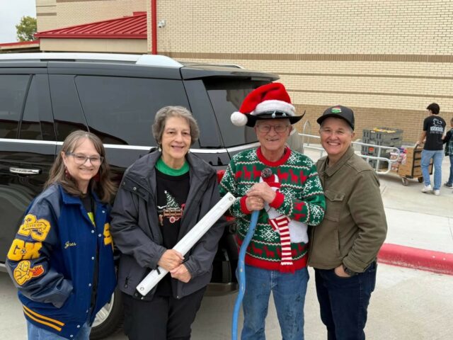 Community Spotlight Theresa Fuller Delivers Christmas Dinners with John’s Kids