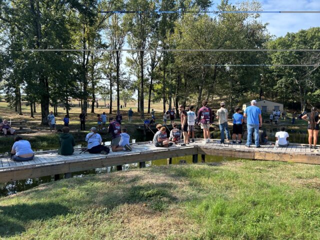 Community Spotlight Brandi Bettis Volunteers at the Hot Springs Board of Realtors Kids Fishing Event